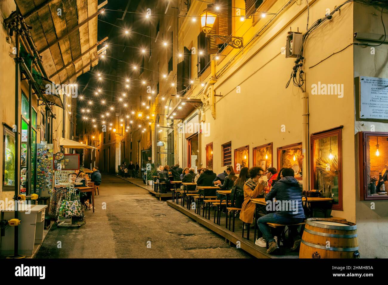 Street restaurant in the old town at night, Palermo, Sicily, Italy Stock Photo
