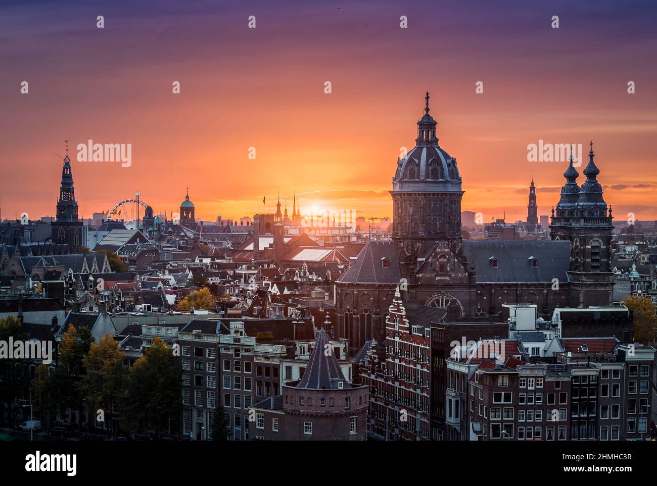 Historic skyline of Amsterdam during sunset, Netherlands Stock Photo