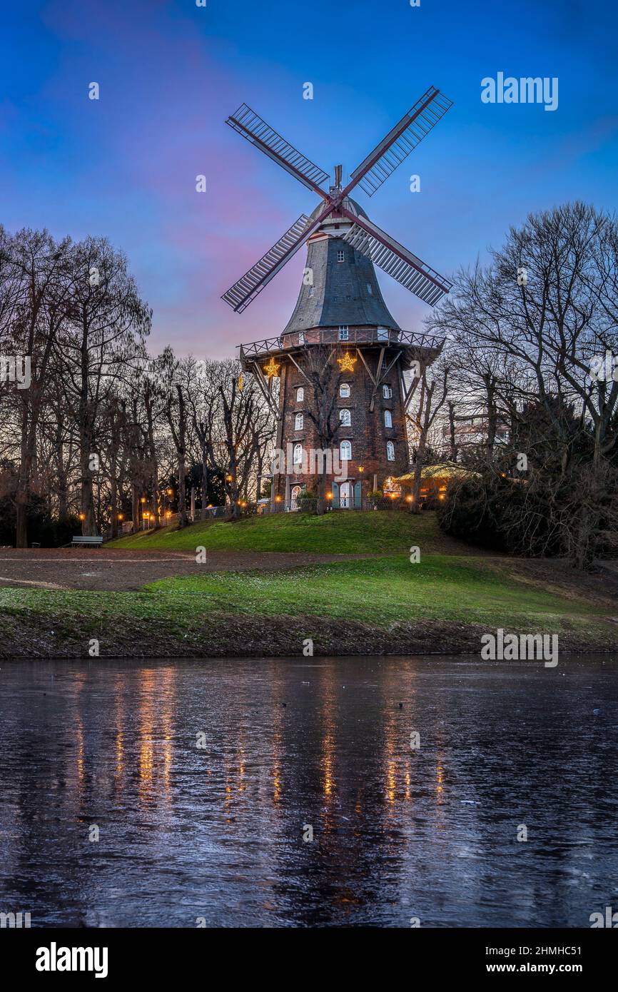 Old windmill in Bremen, Germany during winter Stock Photo