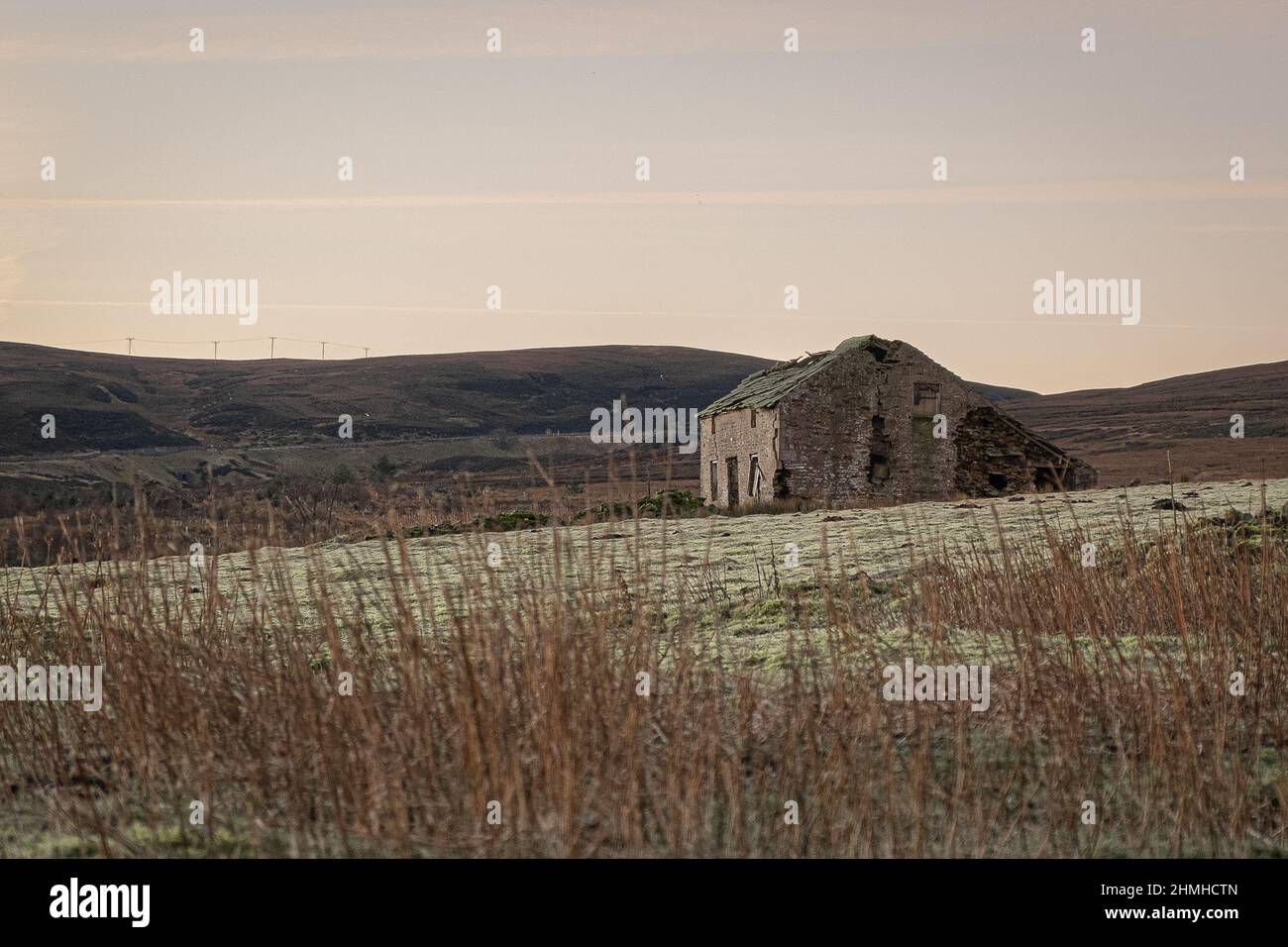Early morning photo of a ruined cottage above Allenheads in Allendale, Northumberland. Stock Photo