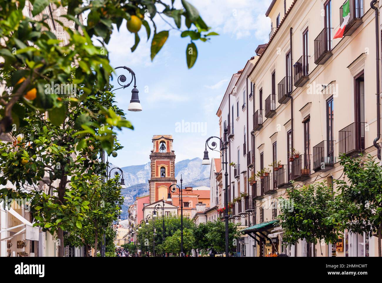 Sorrento, Campania, Italy : The pedestrian street of Corso Italia with the Duomo di Sorrento bell tower in the background Stock Photo