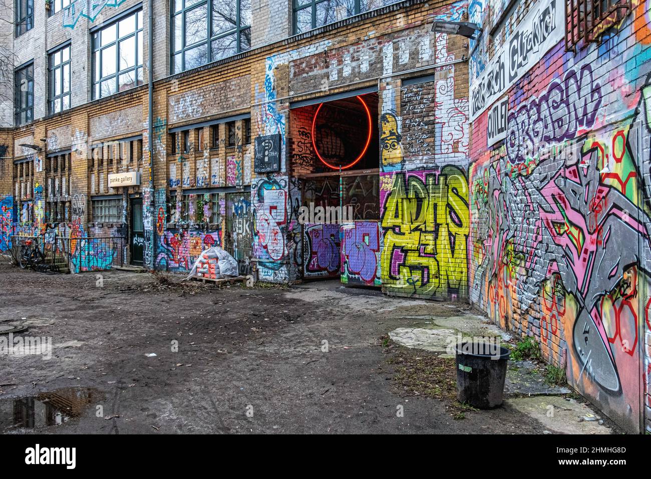 Wedding, Berlin. Entrance of dilapidated old industrial building next to Panke river at Gerichtstrasse 23. Residential & business use. Stock Photo