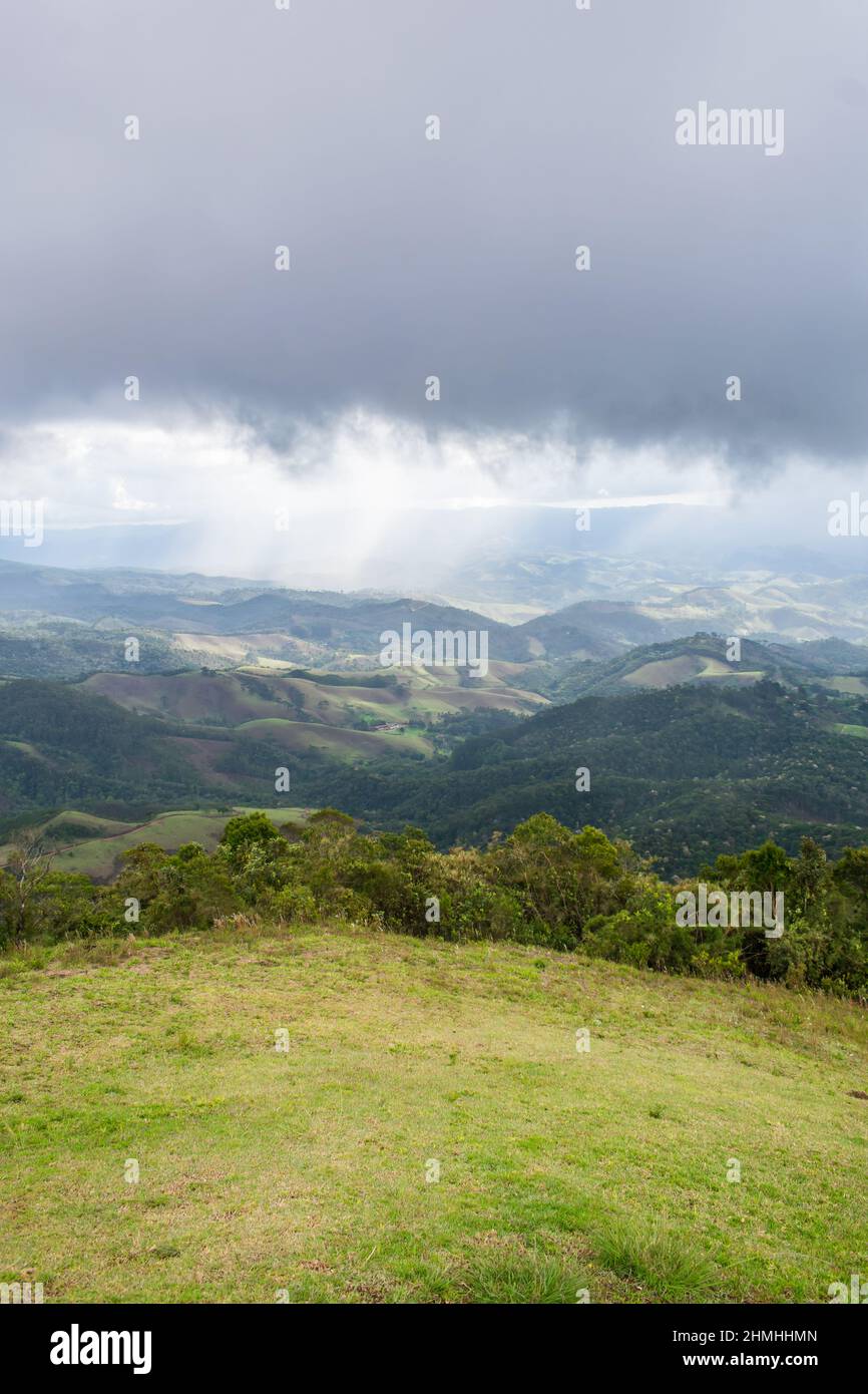 A cloudy view from Pico Agudo - a high mountain top with a 360 degree view of the Mantiqueira Mountains (Santo Antonio do Pinhal, Brazil) Stock Photo