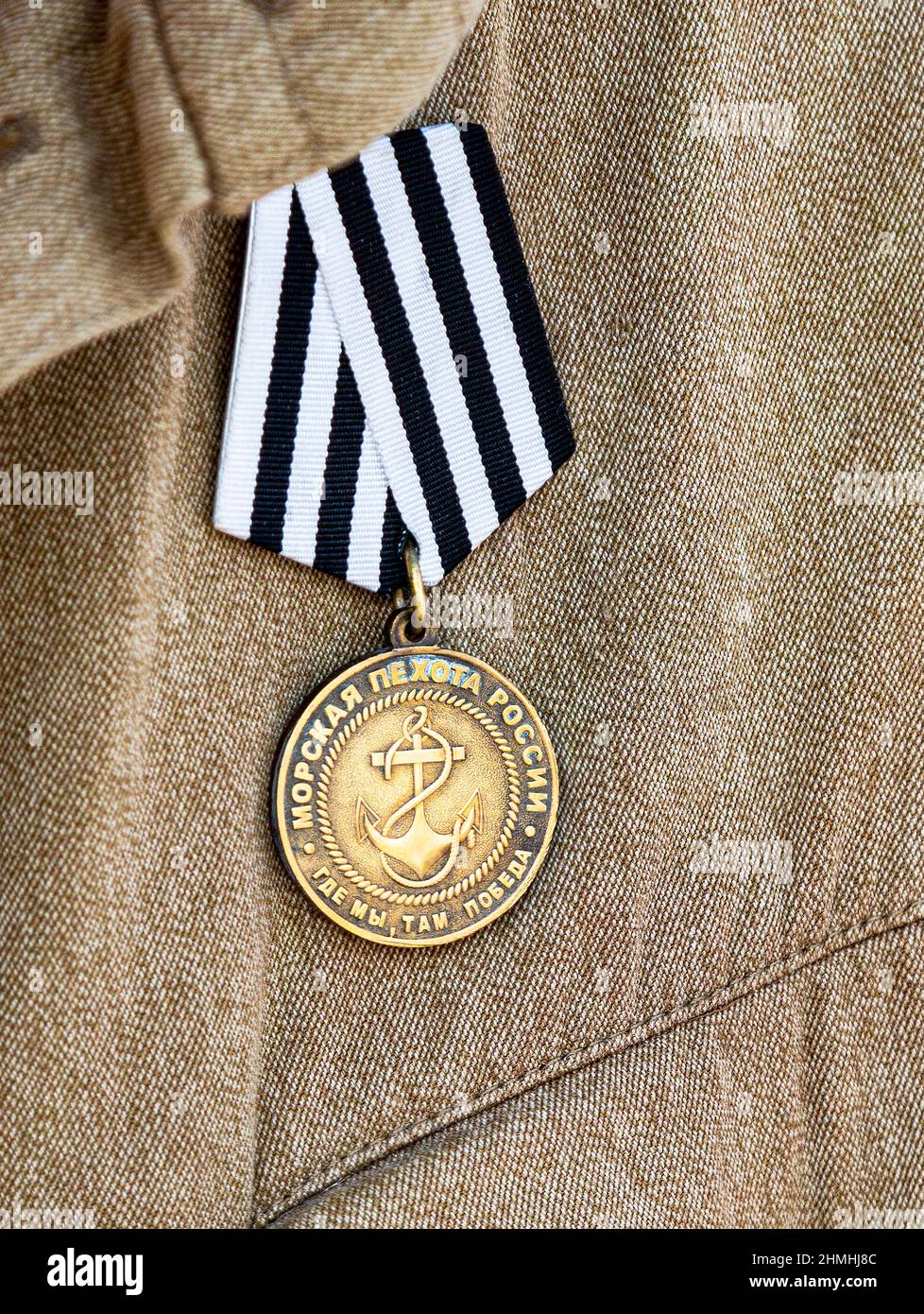 Samara, Russia - April 13, 2019: Commemorative medal of the Marine Corps of Russia on a military uniform. Translate from Russian: Marine Corps of Russ Stock Photo