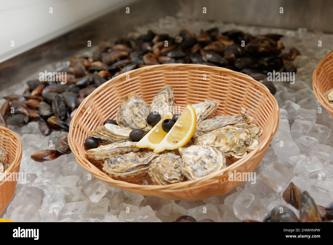 Oysters on ice in a fish shop Stock Photo