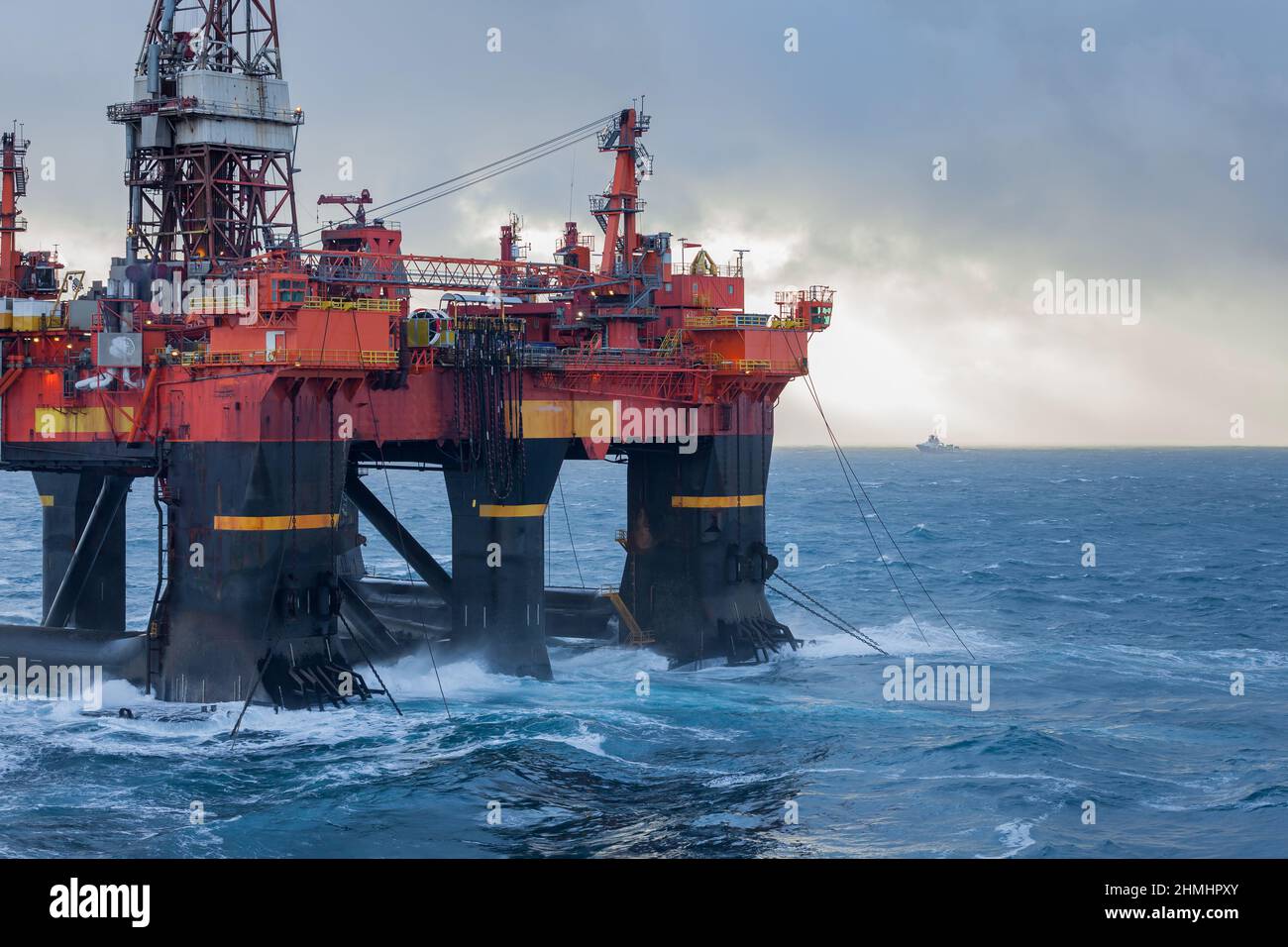 Semi Submersible rig West Alpha deballasting and ready for rig move in Norwegian harsh weather condition Stock Photo