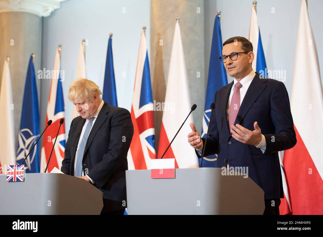 Warsaw, Warsaw, Poland. 10th Feb, 2022. Polish Prime Minister MATEUSZ MORAWIECKI (R) and Prime Minister of Britain BORIS JOHNSON (L) give a press conference at the chancellery of the Prime Minister on February 10, 2022 in Warsaw, Poland. The British Prime Minister Borish Johnson met Polish Prime Minister Mateusz Morawiecki to discuss about security in eastern Europe and Russian military build up on the border with Ukraine.) welcomes the Prime Minister of Britain BORIS JOHNSON (R) at the chancellery of the PM ahead of talks. Credit: ZUMA Press, Inc./Alamy Live News Stock Photo