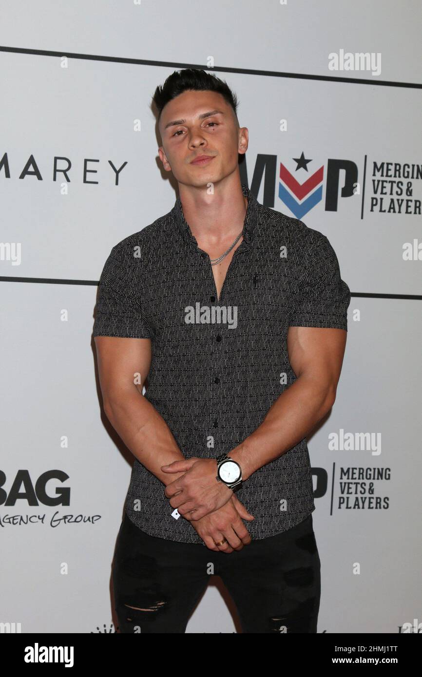 Los Angeles, CA. 9th Feb, 2022. Christian Flenor at arrivals for Merging Vets and Players (MVP) Charity Super Bowl Kick-Off Benefit Fundraiser, Academy LA Nightclub, Los Angeles, CA February 9, 2022. Credit: Priscilla Grant/Everett Collection/Alamy Live News Stock Photo
