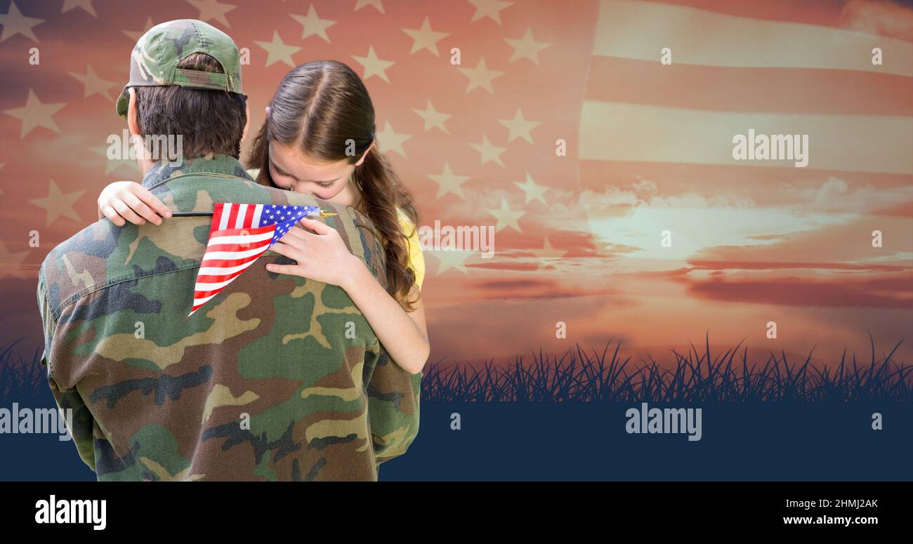 Caucasian girl embracing young male soldier while standing against sky with us flag during sunset Stock Photo