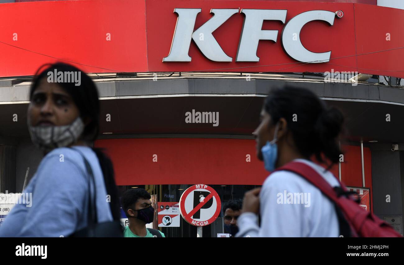 Mumbai, India. 09th Feb, 2022. People walk past Kentucky Fried Chicken (KFC) restaurant in Mumbai.Kentucky Fried Chicken (KFC) apologised for the post in support of Kashmir solidarity day by its Pakistan franchise on the social media. (Photo by Ashish Vaishnav/SOPA Images/Sipa USA) Credit: Sipa USA/Alamy Live News Stock Photo