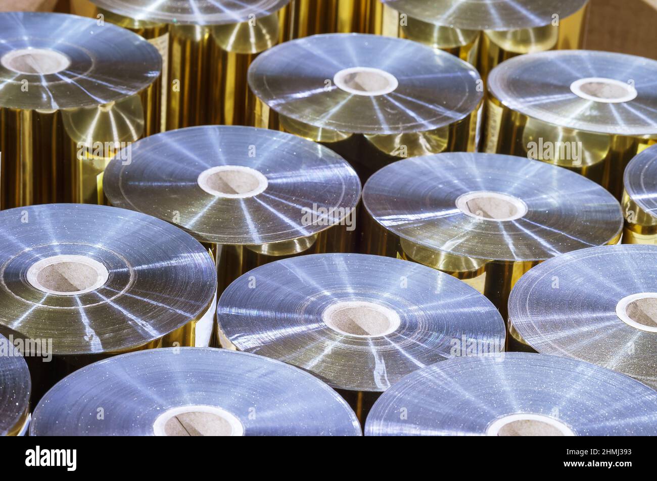 Foil in the printing shop. Aluminum technical foil. Rolls of foil for