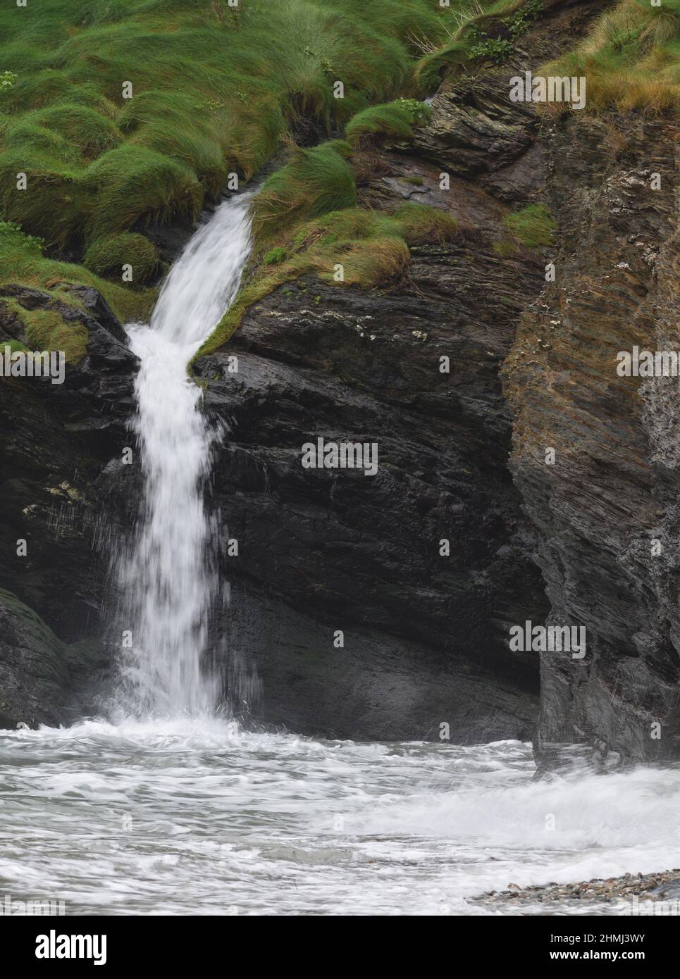 Waterfall at Trenarren Head St Austell Cornwall Stock Photo