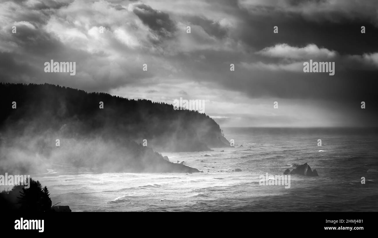 The mist above the windy Pacific Ocean surf near False Klameth Cove