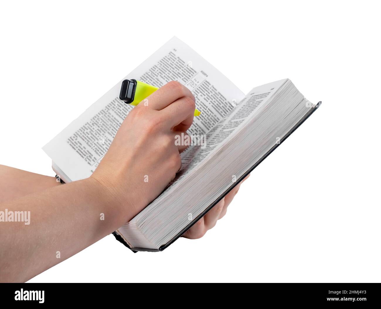 Book highlight. Hand marking important text in book isolated on white background. Education, preparing for exams concept. High quality photo Stock Photo