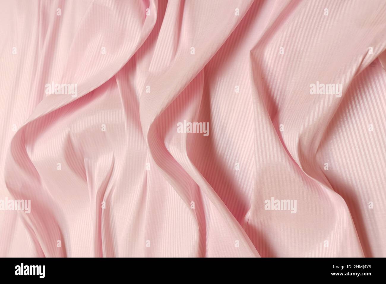 Pink crumpled or wavy fabric texture background. Abstract linen cloth soft  waves. Silk atlas or stretch jacquard. Smooth elegant luxury cloth texture  Stock Photo - Alamy