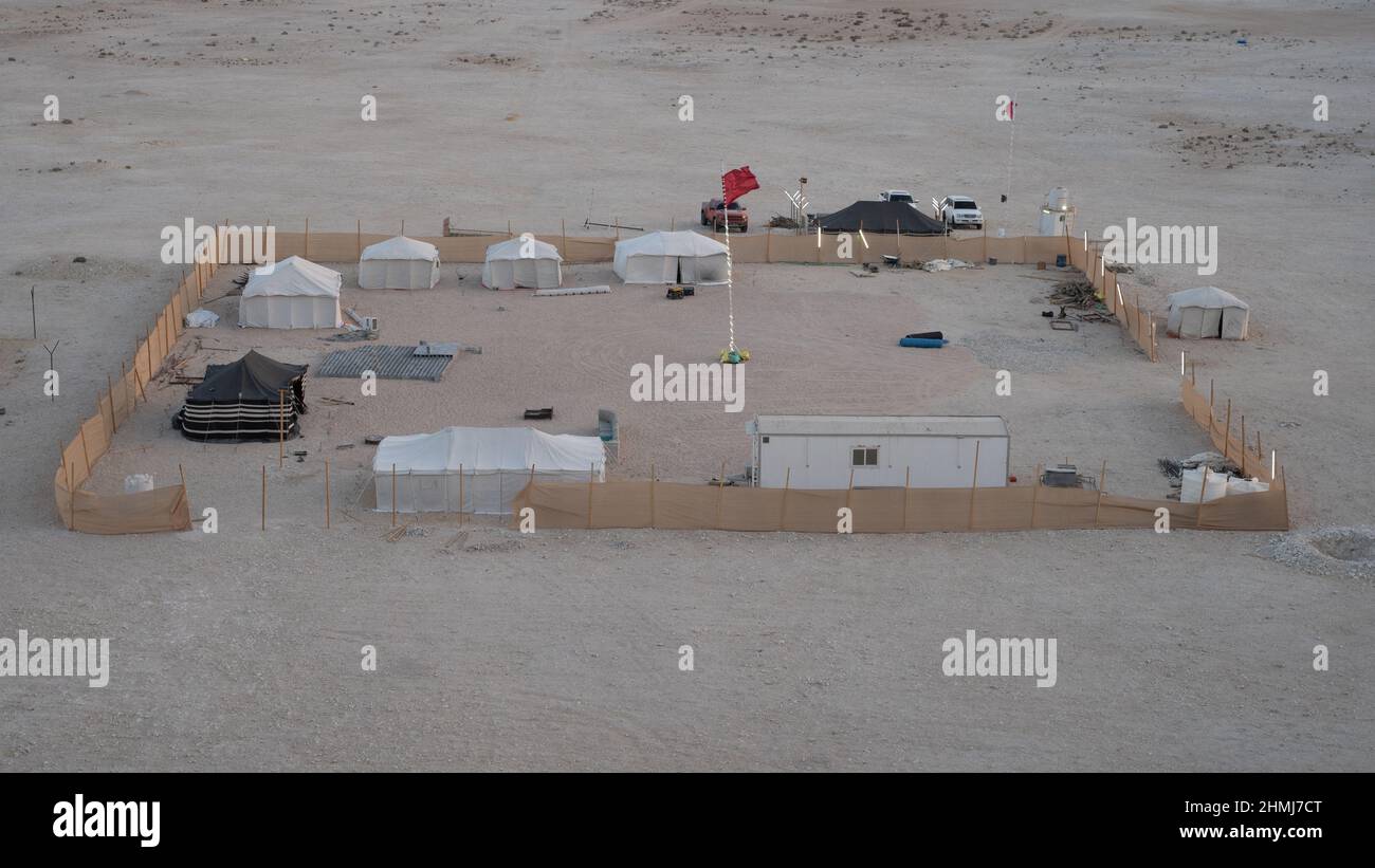 Singing sand dunes,Qatar December 14, 2021 family Winter desert