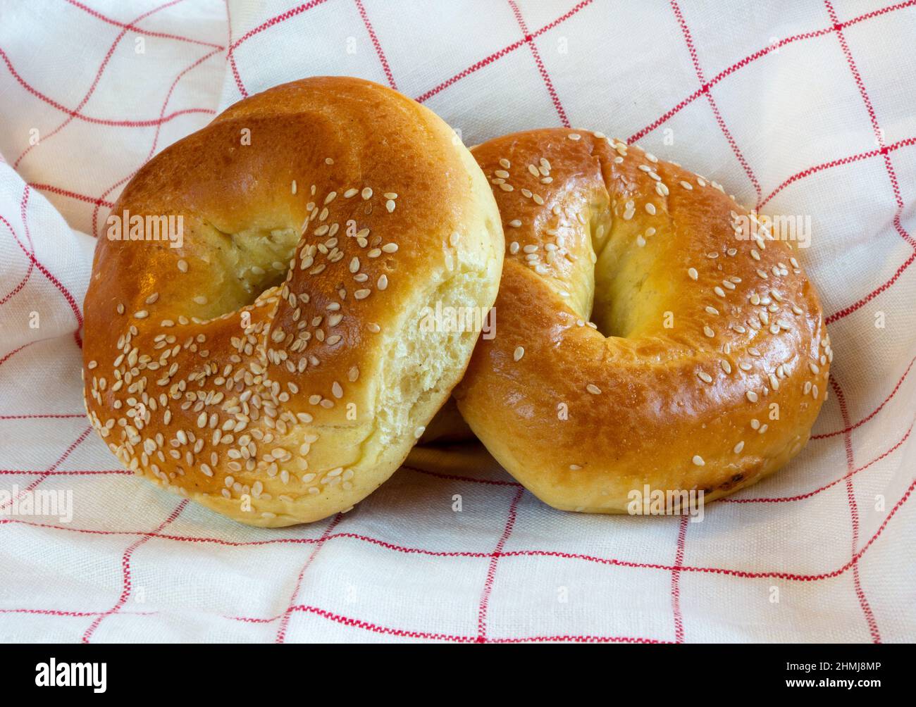 Sesame rolls on kitchen towel background Stock Photo