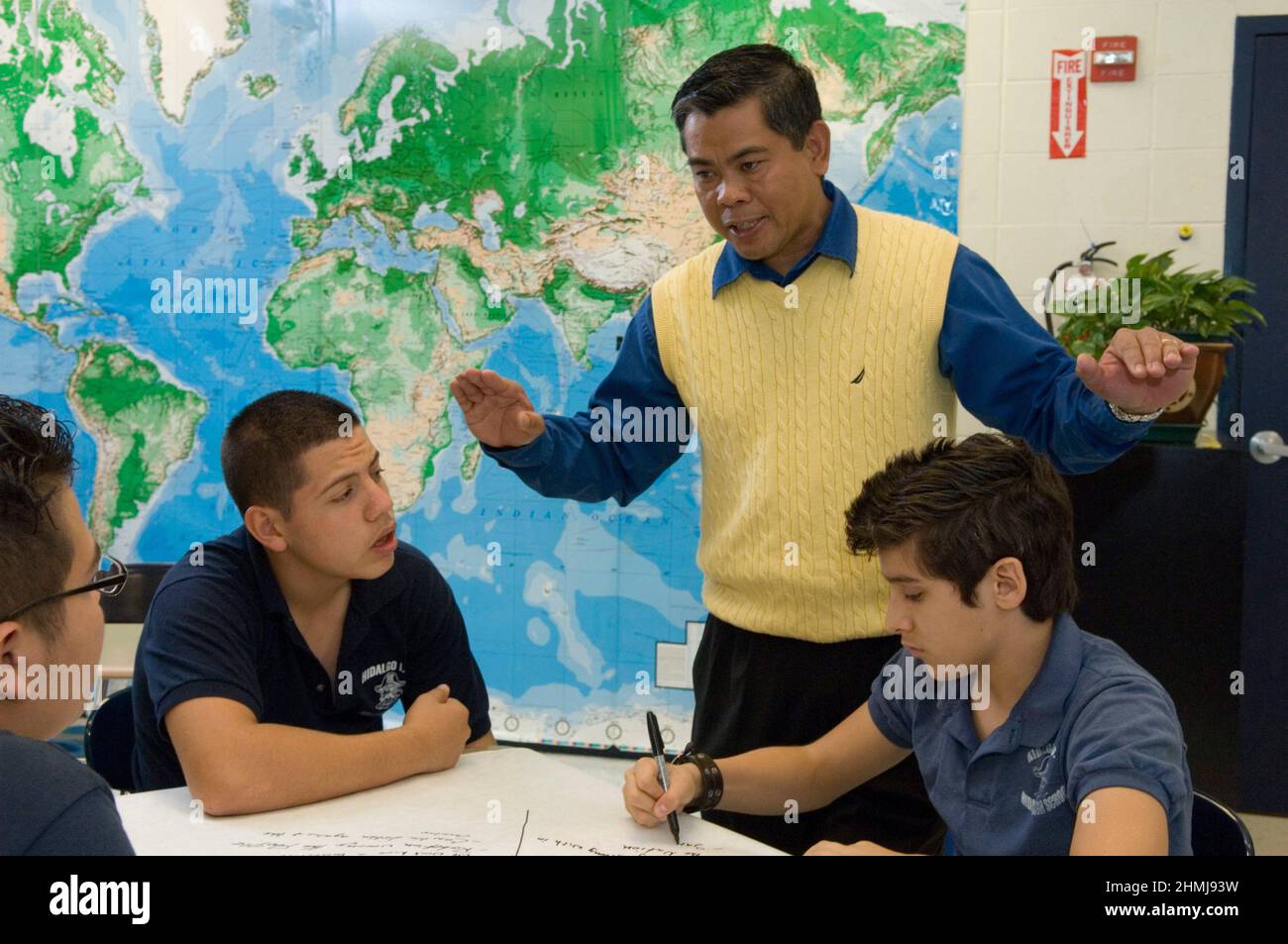 Hidalgo Texas USA, February 26, 2007: Hidalgo Early College High School Filipino social studies teacher with 10th grade Hispanic students. ©Bob Daemmrich Stock Photo