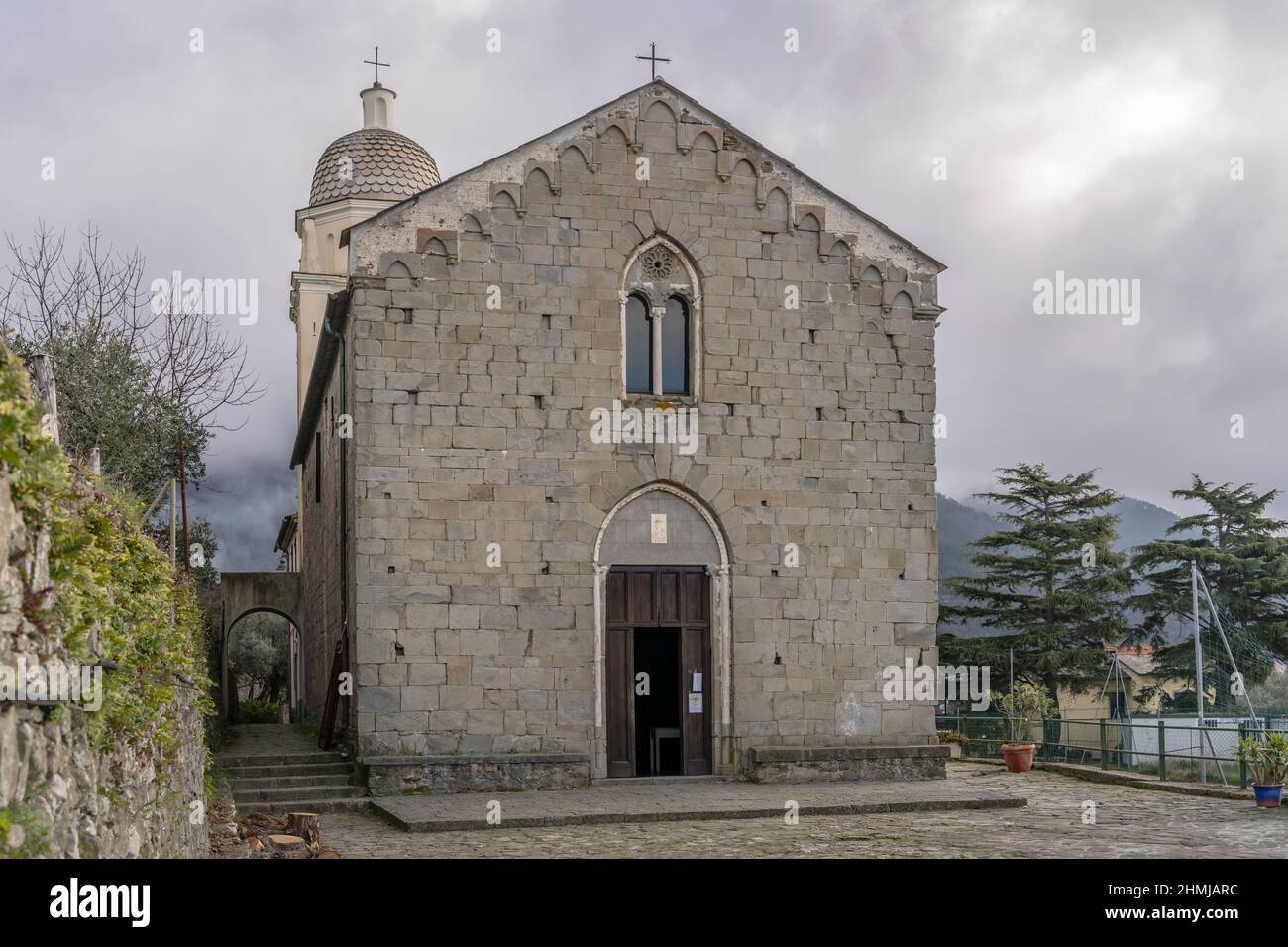 historical 'Nostra Signora della Salute'  church, shot in bright cloudy winter light at Volastra,  Cinque Terre, Italy Stock Photo