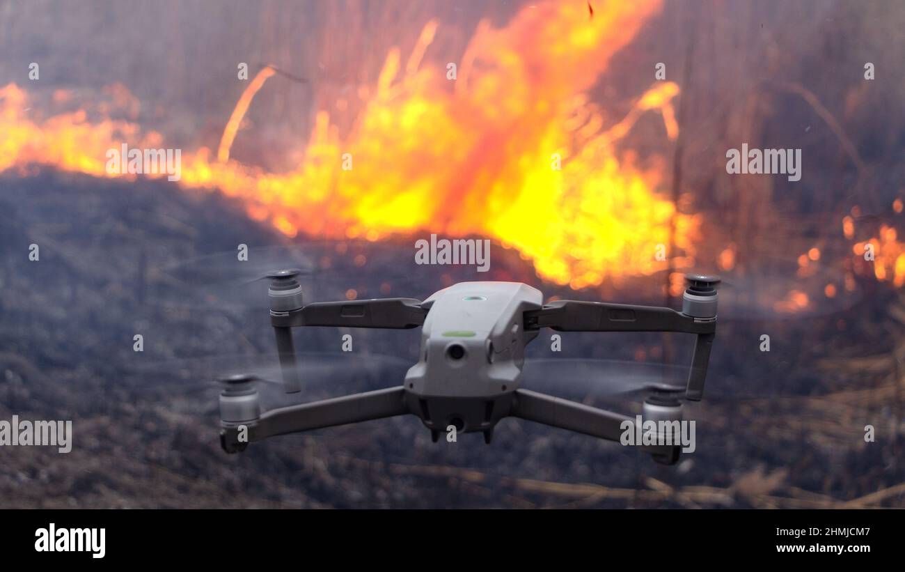 The use of drones in firefighting. Monitoring of dry grass fire with
