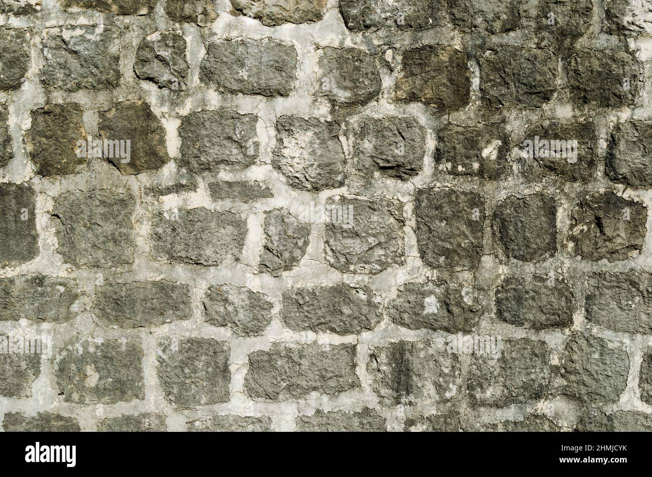 Background of old stone wall of ancient castle close up Stock Photo - Alamy