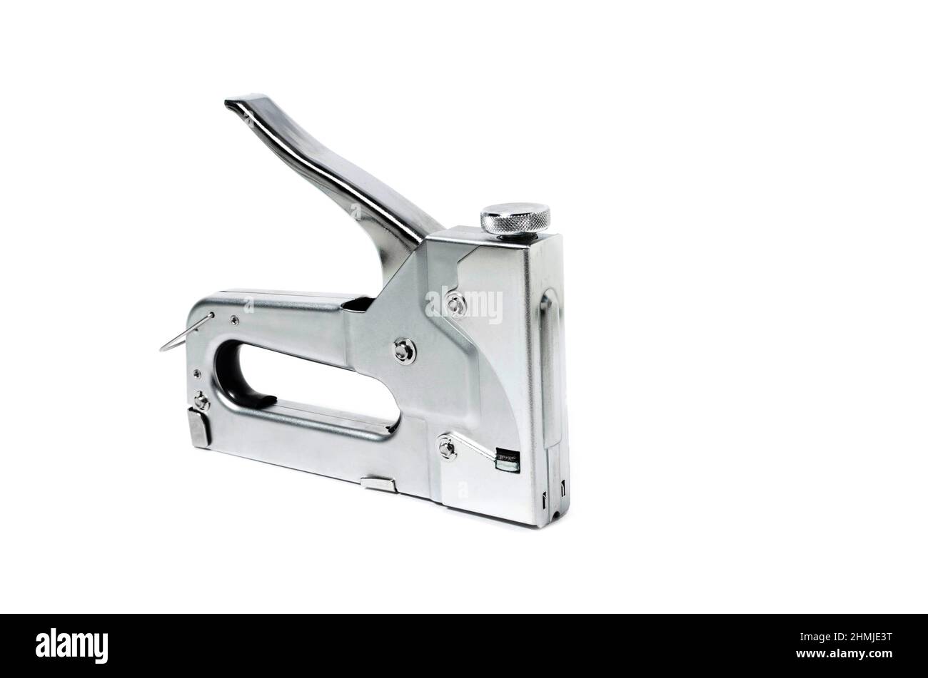 Metal Nickel plated stapler gun on white background, isolate close up. Stock Photo