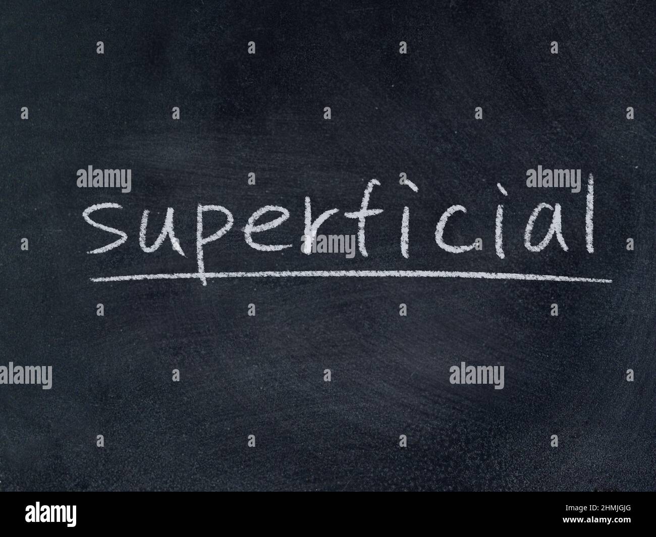 superficial concept word on blackboard background Stock Photo