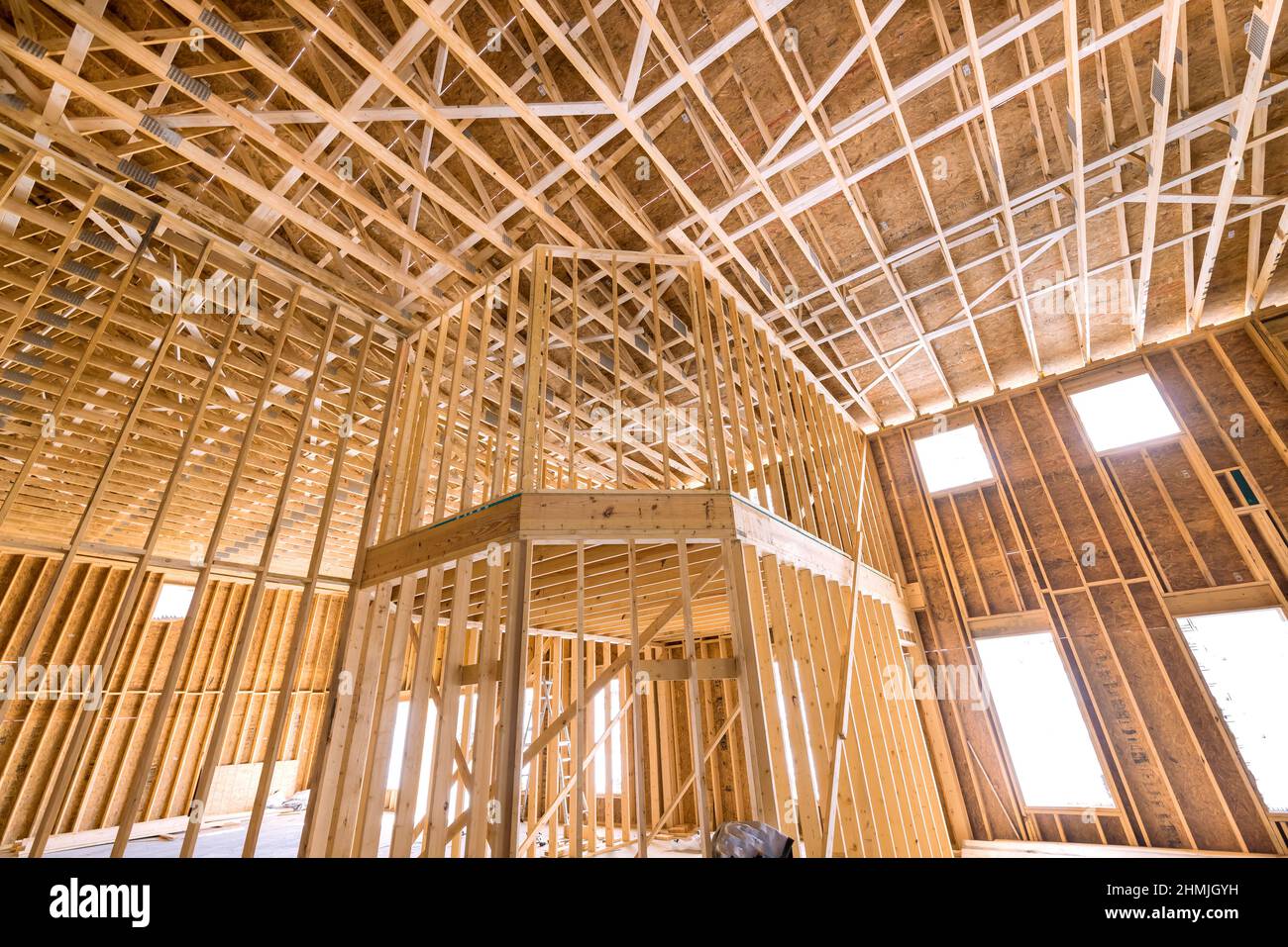 Framing beams view of wood framework a new wooden house under construction Stock Photo