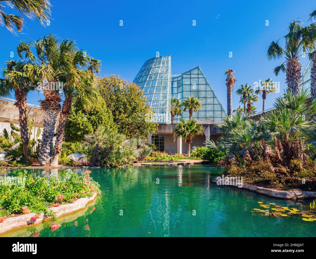 Sunny view of a green house in San Antonio Botanical Garden at Texas ...