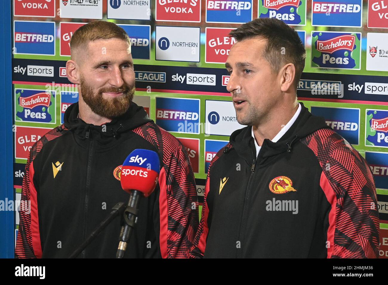 St Helens, UK. 10th Feb, 2022. Sam Tomkins (29) of Catalans Dragons and Mitchell Pearce (6) of Catalans Dragons speak to Sky Sports in St Helens, United Kingdom on 2/10/2022. (Photo by Craig Thomas/News Images/Sipa USA) Credit: Sipa USA/Alamy Live News Stock Photo