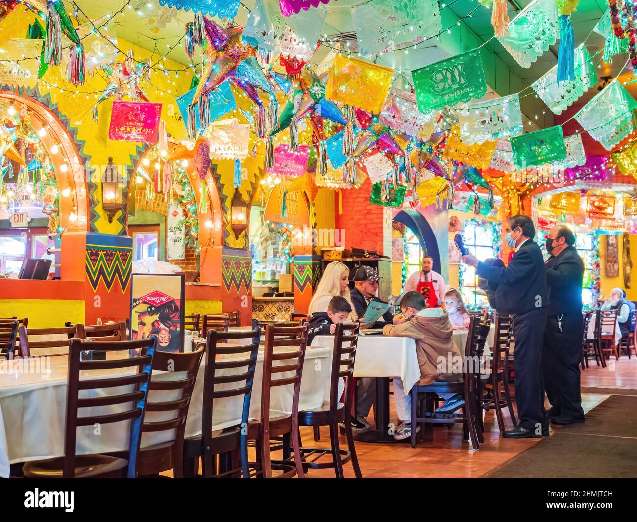 Texas, FEB 2 2022 - People doing musical performance in the El Mercado Snack Bar Stock Photo