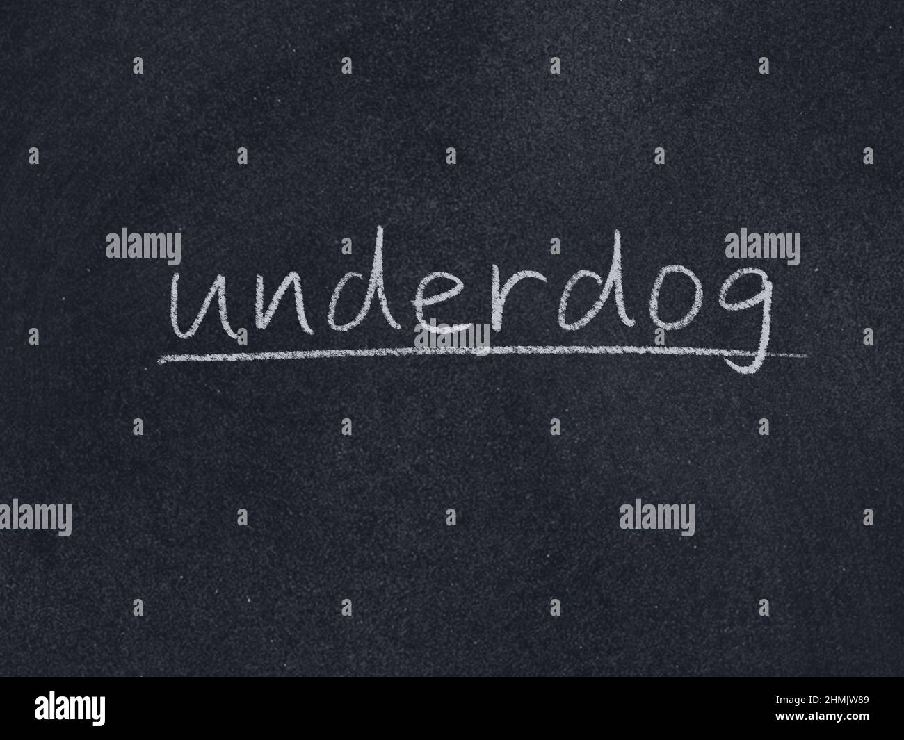 underdog concept word on blackboard background Stock Photo - Alamy