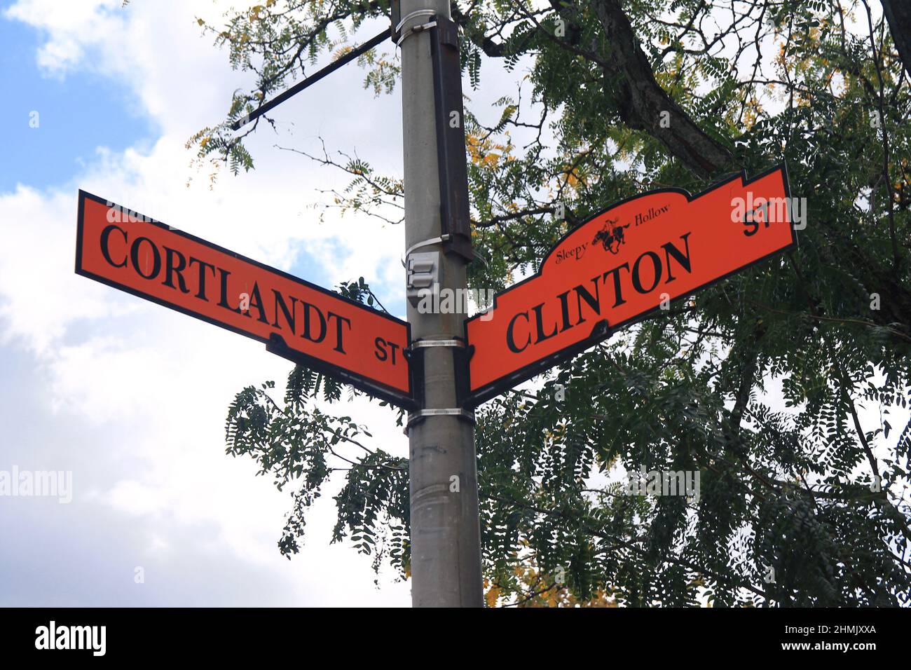 Orange sign on the corner between Cortlandt and Clinton street in Sleepy Hollow in New York State Stock Photo