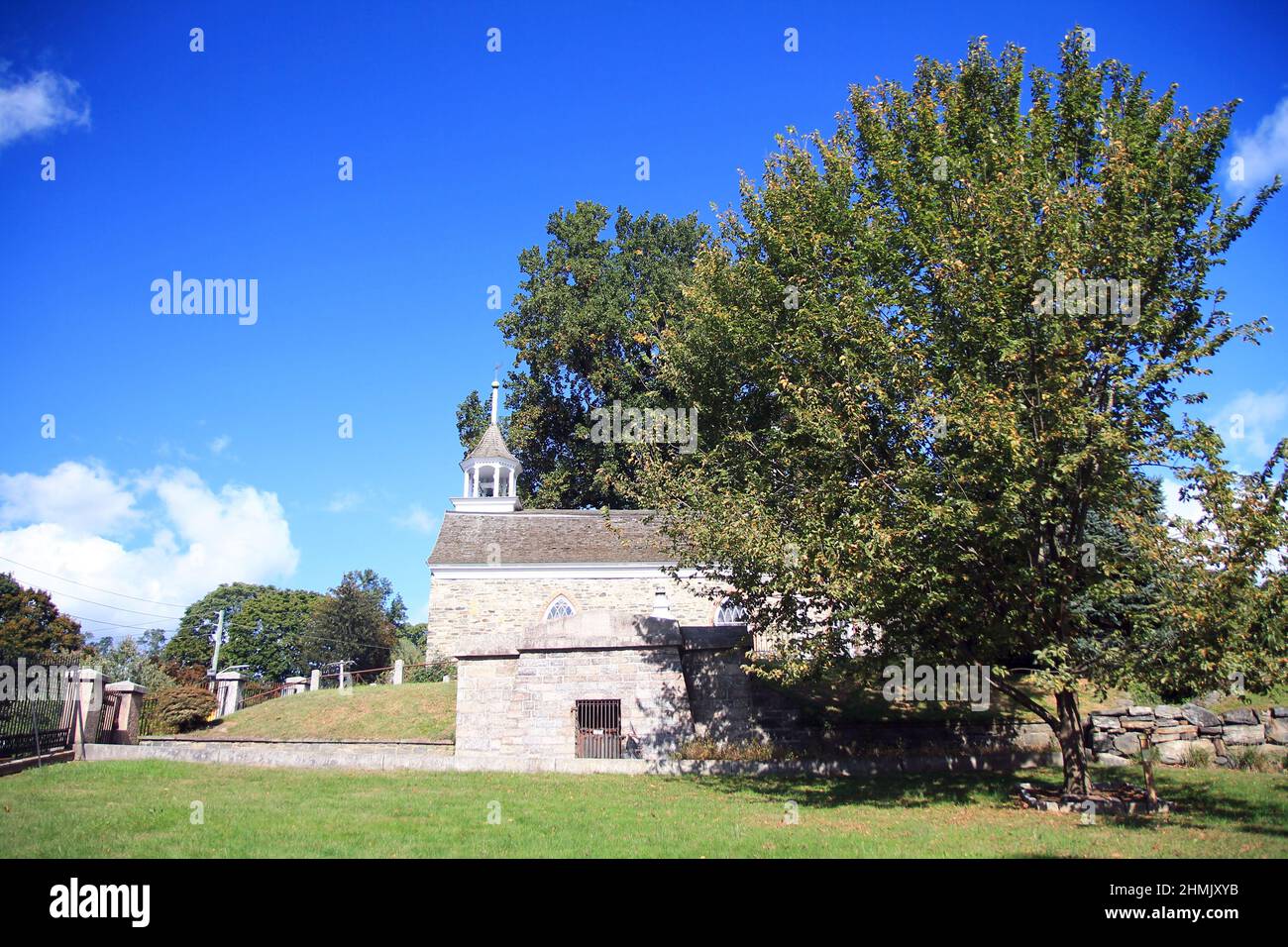 The big tree with the famous Sleepy Hollow Church on the back in the New York State Stock Photo