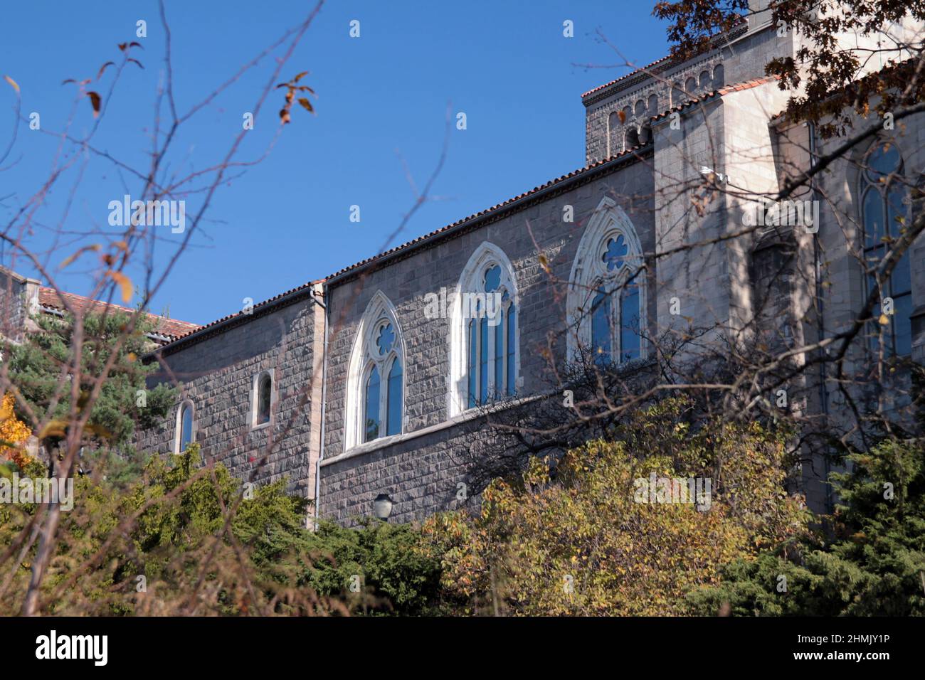 Close up of the white arch windows of the Cloisters in New York City Stock Photo