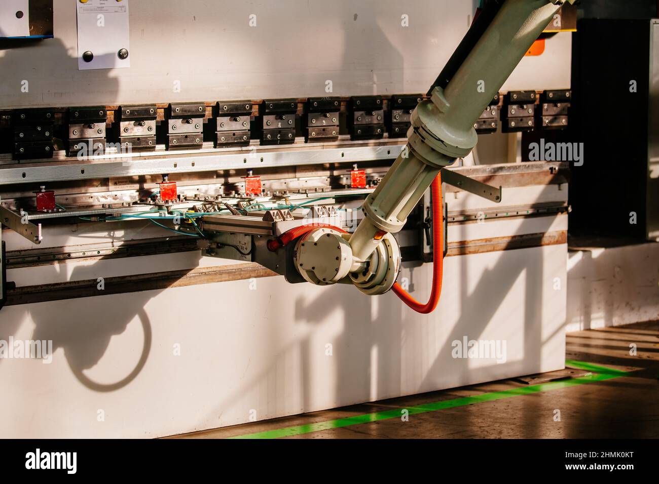 Robotic arm working with metal sheet at hydraulic bending machine Stock  Photo - Alamy
