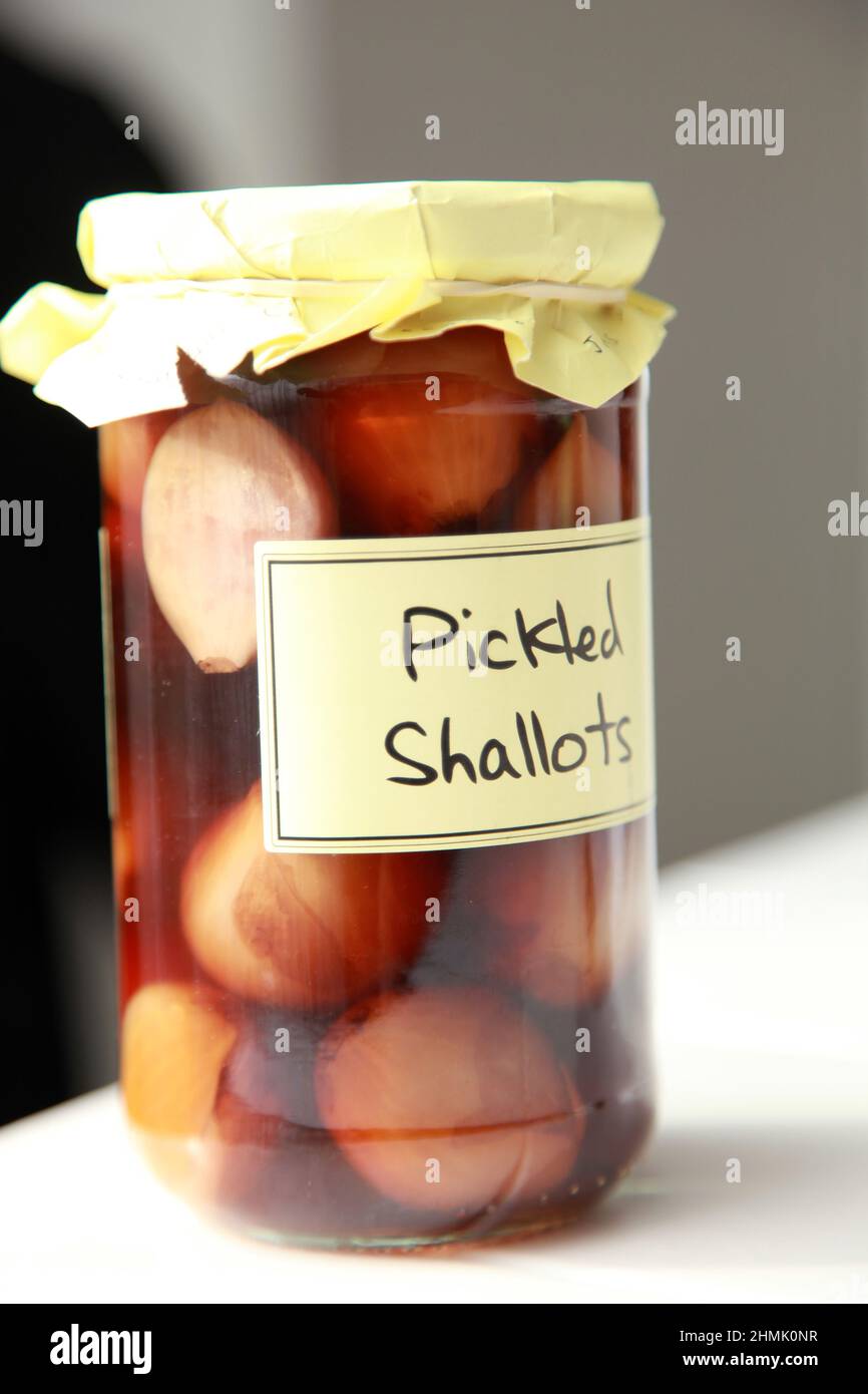 A home made jar of Pickled Shallots. Stock Photo