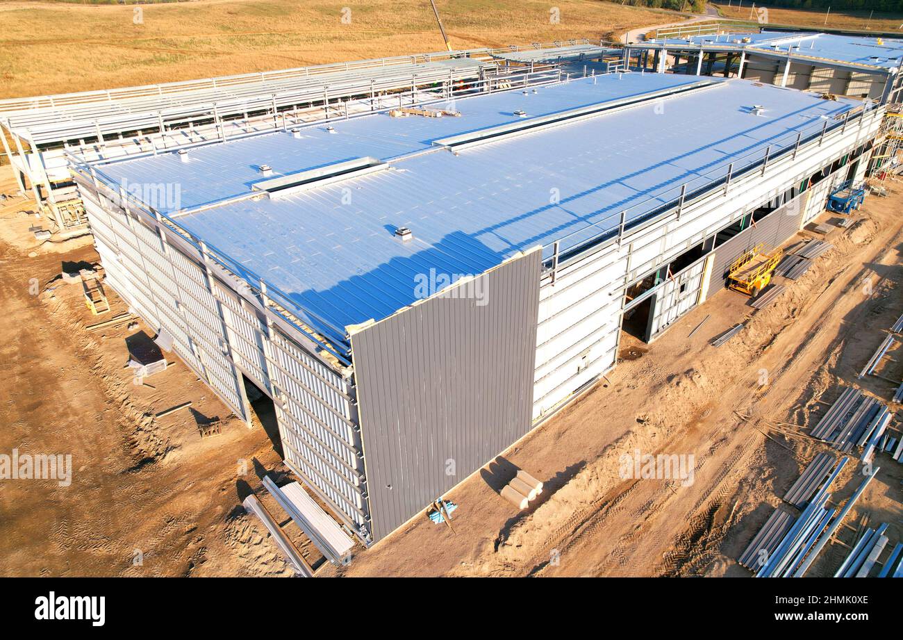 Warehouse Construction from metal structure. Industrial building on