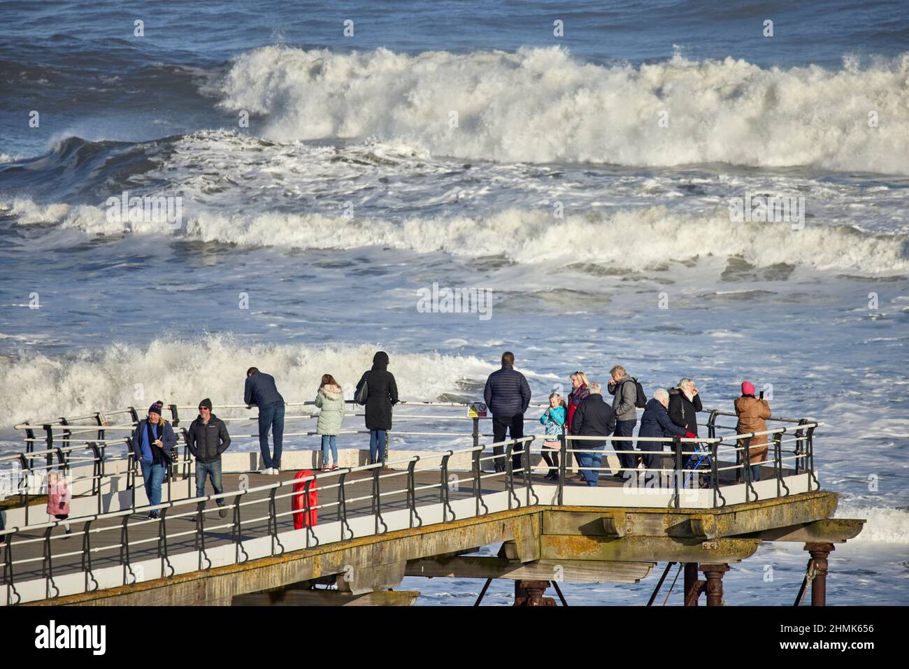 Grade II* listed Saltburn Pier, Rough North Sea waves at the pier Saltburn-by-the-Sea, Redcar and Cleveland, North Yorkshire, England Stock Photo