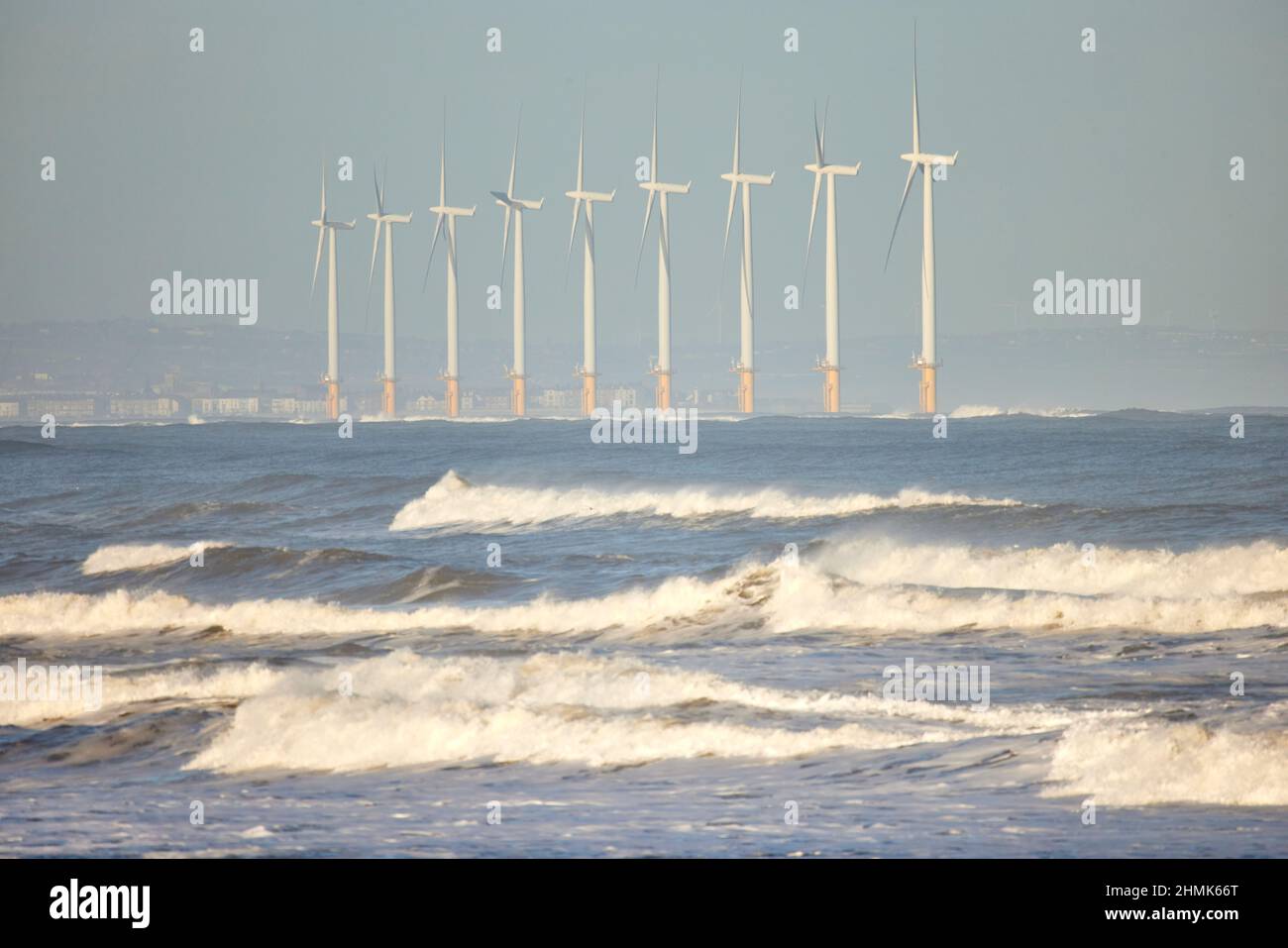 North Sea wind farm turbines off shore at  Saltburn-by-the-Sea, Redcar and Cleveland, North Yorkshire, England Stock Photo