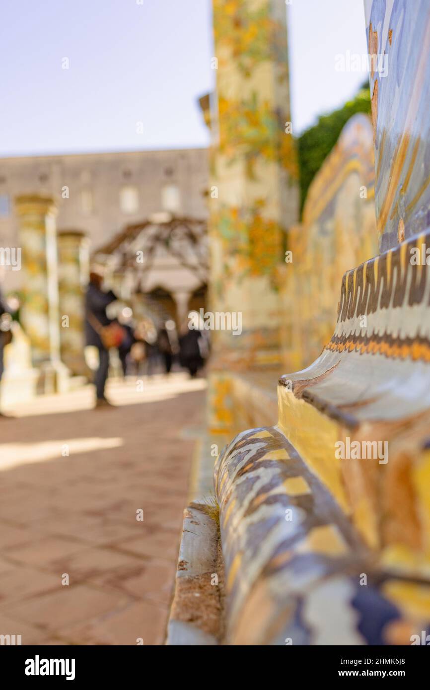 Naples, Italy, 22 January 2022: Some tourists are enjoying Santa Chiara Cloister Stock Photo