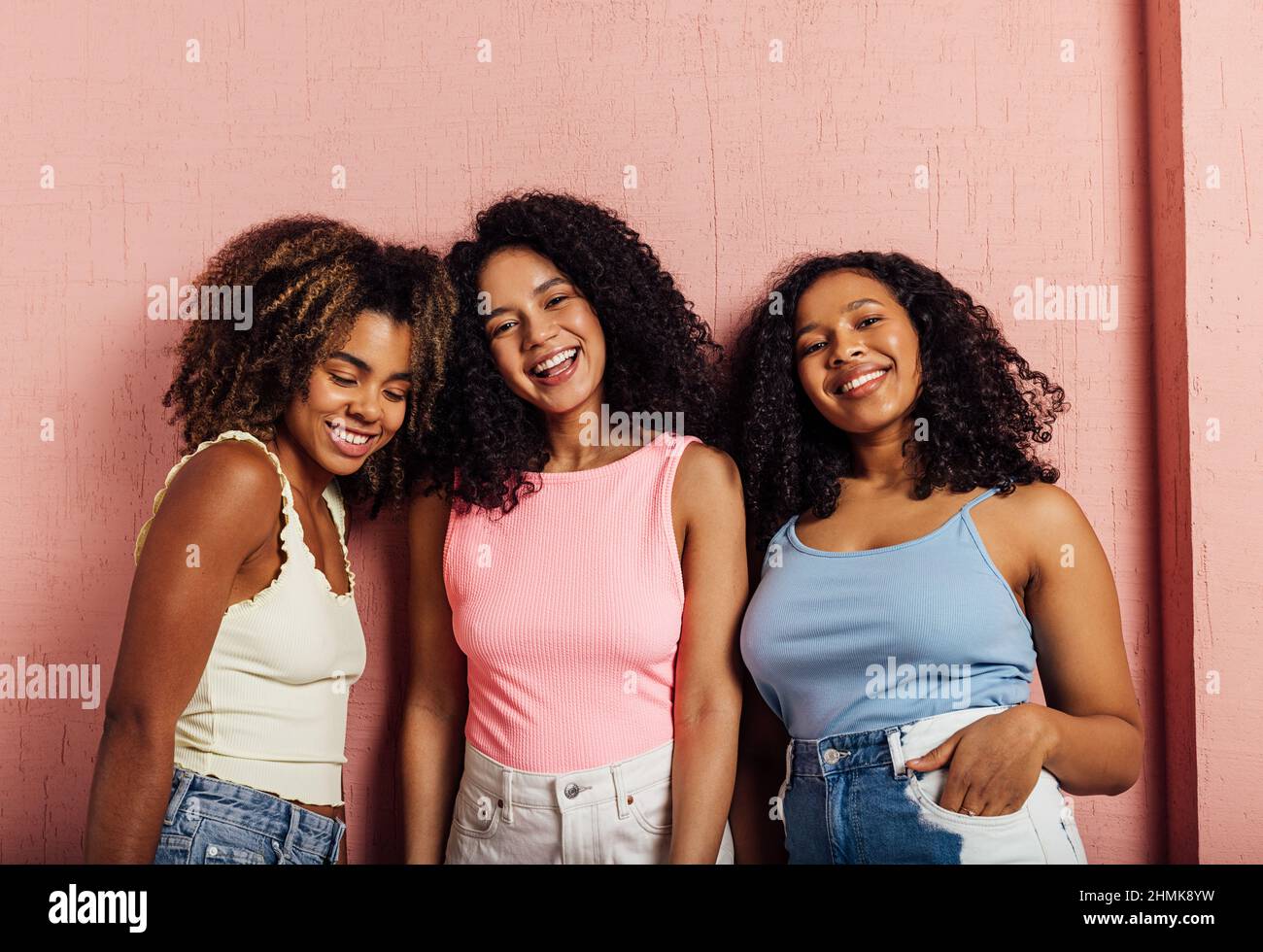 Three women posing camera hi-res stock photography and images - Alamy