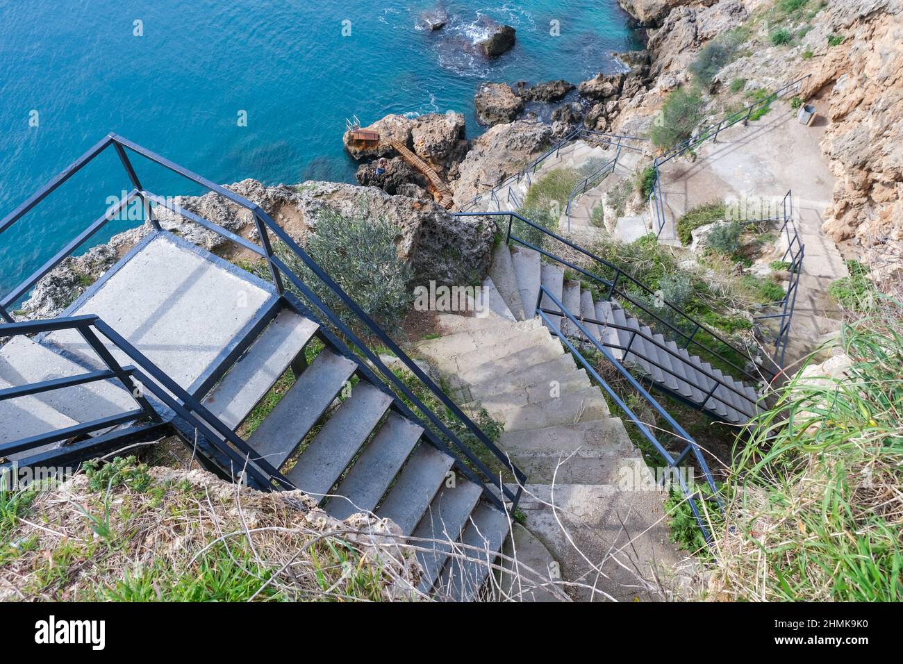 Antalya lara cliffs, stairs descending from the top down to the sea, Stock Photo