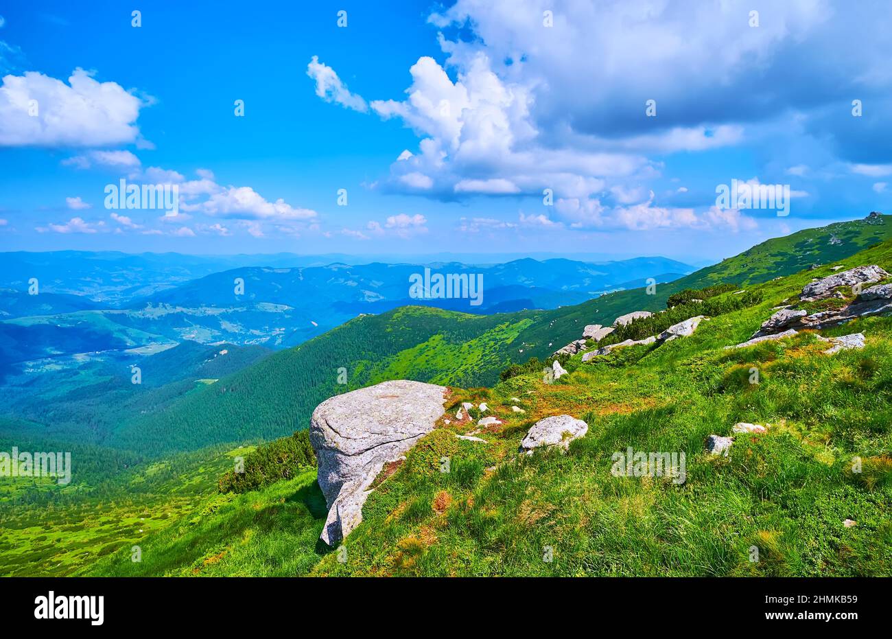 Impressive mountain landscape of Chornohora range from the peak of Mount Eared Stone (Vykhatyi Kamin), Carpathians, Ukraine Stock Photo