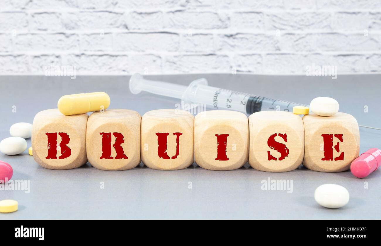 word BRUISE on wooden block. Medical concept Stock Photo Alamy
