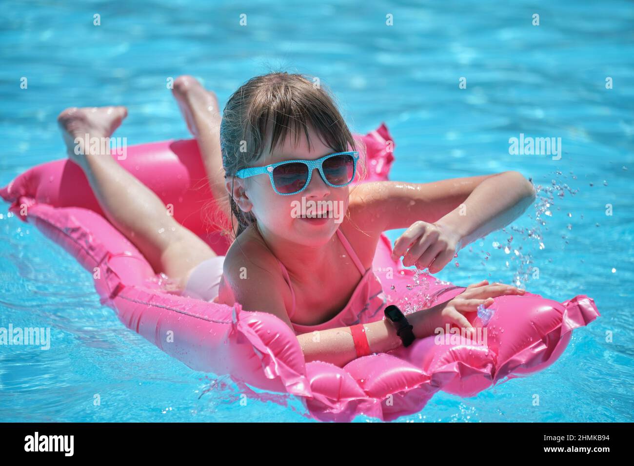 Girl floating in inflatable raft hi-res stock photography and images ...