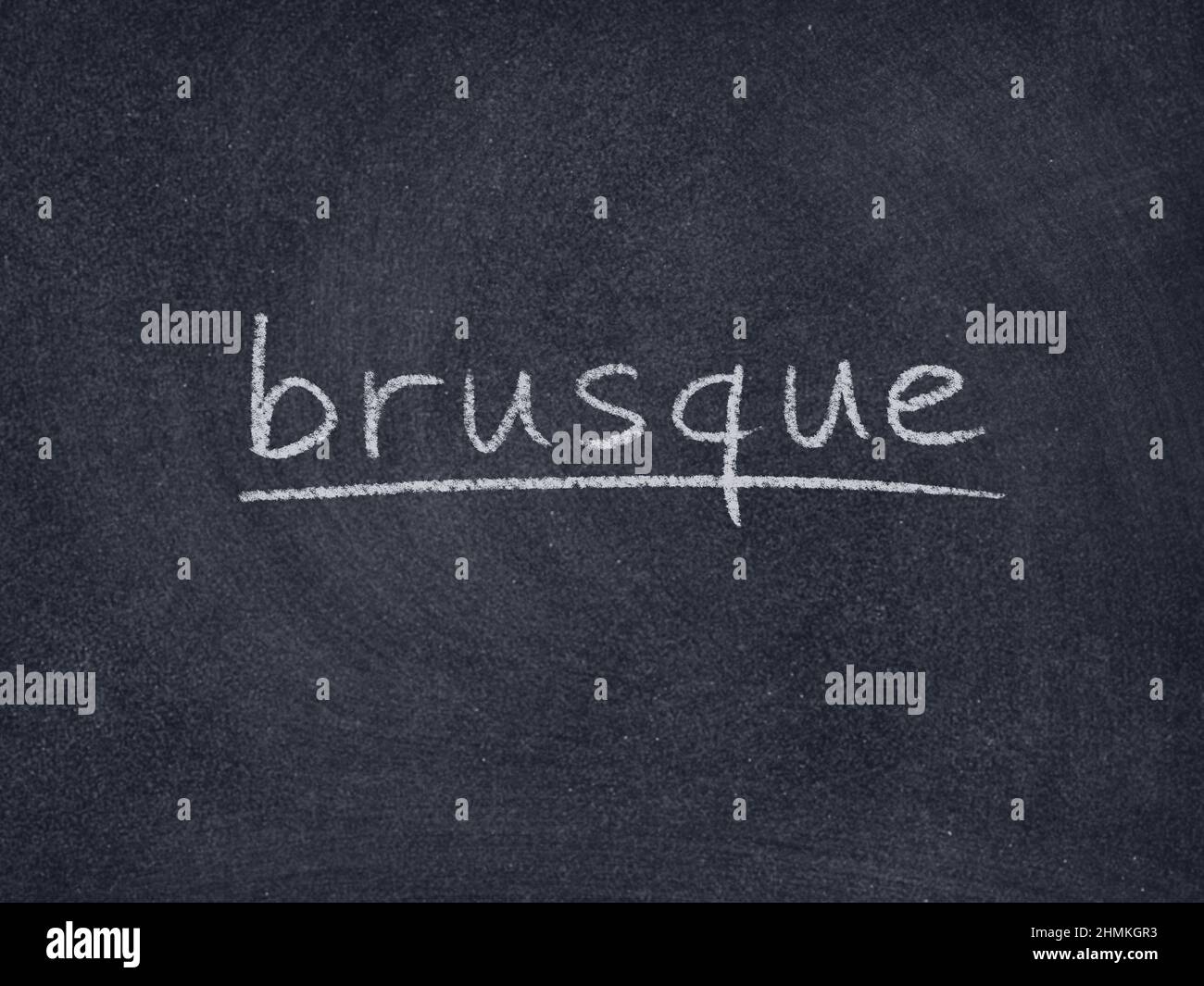 brusque concept word on blackboard background Stock Photo