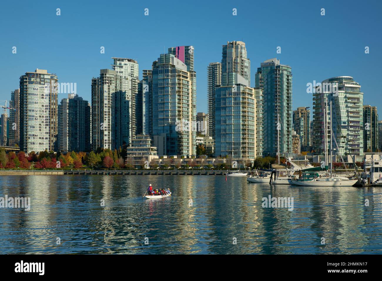 Vancouver, British Columbia, Canada – October 14, 2018. Dragon Boat Practise False Creek. A Dragonboat team practises on the calm water of False Creek Stock Photo