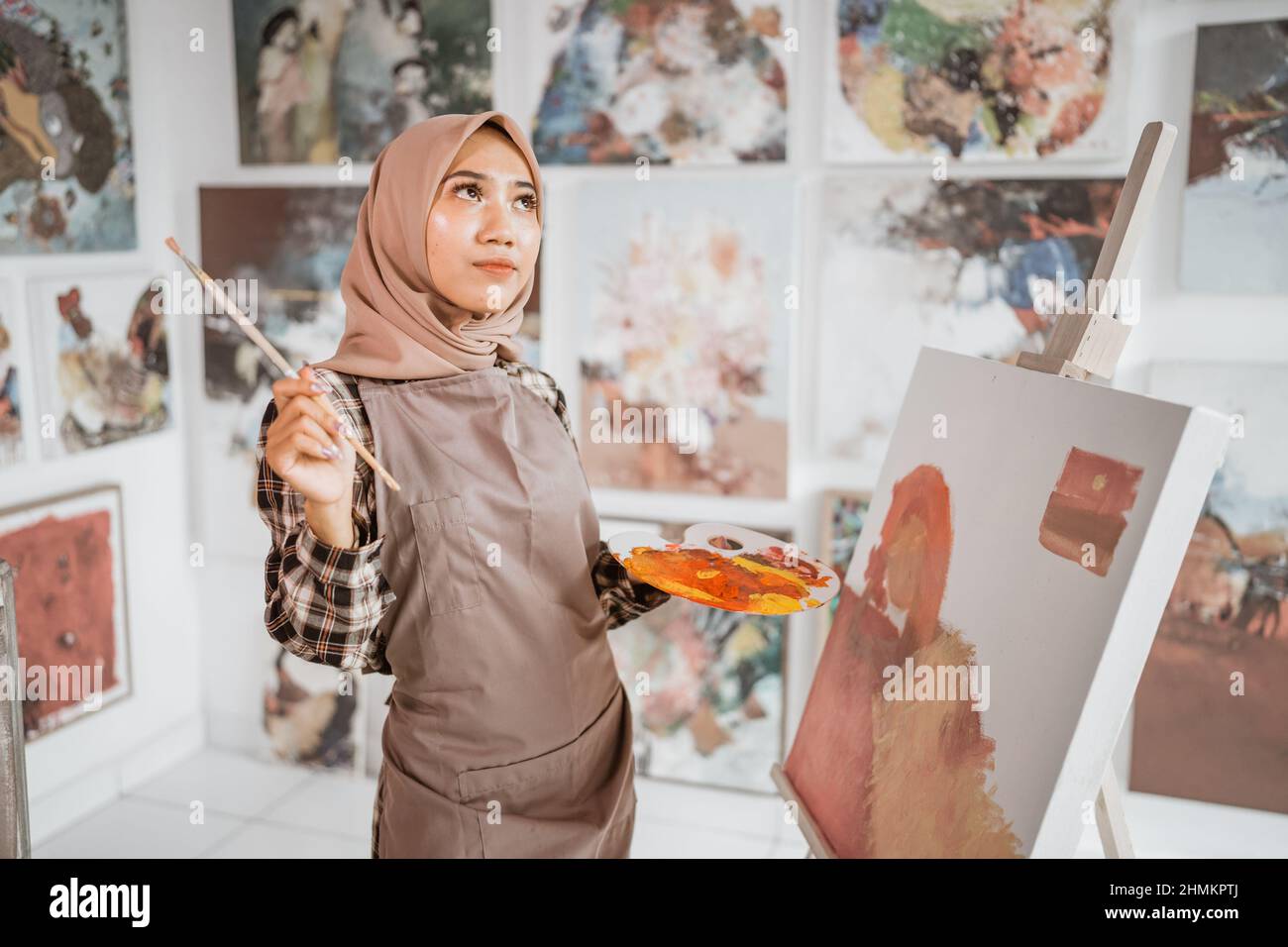 muslim artist painter thinking about what to paint Stock Photo Alamy