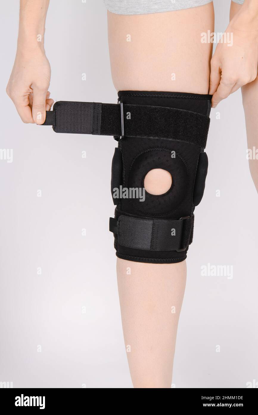 Knee Support Brace on leg isolated on white background. Elastic